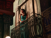 Delgado can't resist stepping out onto the show's elegant balcony